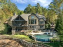 Nestled along the pristine waters of Lake Keowee in the coveted for sale in Six Mile South Carolina Pickens County County on GolfHomes.com