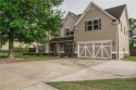 Welcome to this beautifully designed 5-bedroom Craftsman home for sale in Villa Rica Georgia Douglas County County on GolfHomes.com