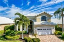 Experience luxury living in this outstanding lakefront home for sale in Bonita Springs Florida Lee County County on GolfHomes.com