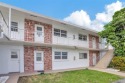 Make this bright and peaceful 2/2 CORNER UNIT, IMPACT WINDOWS for sale in Pompano Beach Florida Broward County County on GolfHomes.com