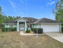 Welcome to this exquisite home featuring a stunning pool and spa for sale in Lecanto Florida Citrus County County on GolfHomes.com