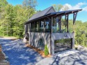 Situated on a private cul-de-sac within the esteemed Waterfall for sale in Clayton Georgia Rabun County County on GolfHomes.com
