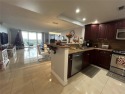 This luxurious penthouse offers breath taking views of the golf for sale in Pompano Beach Florida Broward County County on GolfHomes.com