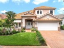LAKEFRONT LUXURY in Prestigious Bayou Club Estates! This fully for sale in Seminole Florida Pinellas County County on GolfHomes.com