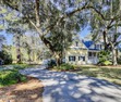 Nestled on a quiet street beneath stunning live oaks, this for sale in Beaufort South Carolina Beaufort County County on GolfHomes.com