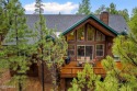 Welcome to your dream  mountain retreat! This stunning cabin for sale in Show Low Arizona Navajo County County on GolfHomes.com