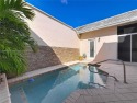 Charming and the largest available courtyard townhome with a for sale in Boca Raton Florida Palm Beach County County on GolfHomes.com