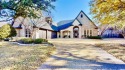 Located in one of the most coveted, gated, locations on all of for sale in Granbury Texas Hood County County on GolfHomes.com