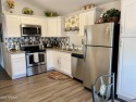 This is a beautifully 1993 updated unit (2019) that's located on for sale in Mesa Arizona Maricopa County County on GolfHomes.com
