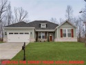 Stunning new cons't home located directly across the street from for sale in Bella Vista Arkansas Benton County County on GolfHomes.com