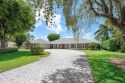 Exceptional Golf Course Living - Privacy, Views, and for sale in Atlantis Florida Palm Beach County County on GolfHomes.com