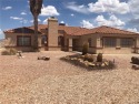 Nice large home on 2 lots. Split floor plan.  Large master suite for sale in Kingman Arizona Mohave County County on GolfHomes.com