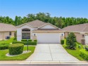 Move In Ready: Beautiful Spacious 3 Bedroom 2 Bath 2 Car Garage for sale in New Port Richey Florida Pasco County County on GolfHomes.com