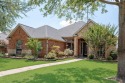 Live luxuriously on the 8th fairway in coveted Firewheel for sale in Garland Texas Dallas County County on GolfHomes.com