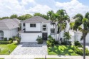Located in the Regents Square section of Woodfield Country Club for sale in Boca Raton Florida Palm Beach County County on GolfHomes.com