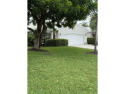 Nestled on a culdesac in the prestigious gated community of for sale in Wellington Florida Palm Beach County County on GolfHomes.com