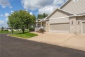 Enjoy scenic views of Mill Run Golf Course from this bright and for sale in Eau Claire Wisconsin Eau Claire County County on GolfHomes.com