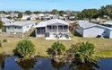 Wow! A custom 1404 sqft canal home close to the main pool! Built for sale in Sebastian Florida Brevard County County on GolfHomes.com