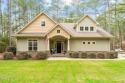 This stunning Craftsman-style home features 5 bedrooms and a for sale in Pinehurst North Carolina Moore County County on GolfHomes.com