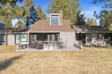 Situated along Sunriver's iconic Great Meadow, this for sale in Sunriver Oregon Deschutes County County on GolfHomes.com