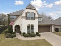 Beautiful 2-story brick and stone home perfectly situated on a for sale in Mansfield Texas Tarrant County County on GolfHomes.com