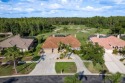 Welcome to this luxurious residence in the gated Crescent Oaks for sale in Tarpon Springs Florida Pinellas County County on GolfHomes.com