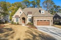 Exceptional home with FOUR full baths in the highly sought-after for sale in Sunset Beach North Carolina Brunswick County County on GolfHomes.com