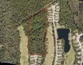 Estate lot 10+/- Acre nestled in a golf course community. EZ for sale in New Smyrna Beach Florida Volusia County County on GolfHomes.com