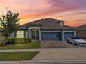 Spacious  Elegant 4-Bedroom Home with Bonus Suite | Prime for sale in Howey IN The Hills Florida Lake County County on GolfHomes.com