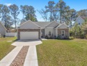 This stunning 3 bedroom, 2 bathroom, one-story home in the Sea for sale in Sunset Beach North Carolina Brunswick County County on GolfHomes.com