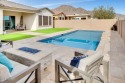 Highland views and pool oasis! Loaded with high-end features for sale in Buckeye Arizona Maricopa County County on GolfHomes.com