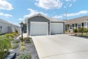 Beautiful 3-bed, 2-bath Charlotte Courtyard Villas with a VIEW! for sale in The Villages Florida Lake County County on GolfHomes.com