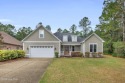 Nestled in a peaceful cul-de-sac with conservation areas to the for sale in Leland North Carolina Brunswick County County on GolfHomes.com