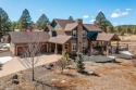 Custom Family Mountain Home with open floorplan and situated on for sale in Flagstaff Arizona Coconino County County on GolfHomes.com