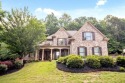 STUNNING 4-Bedroom Executive Home in the Prestigious Woodmont for sale in Canton Georgia Cherokee County County on GolfHomes.com