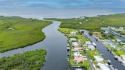 Located in Seaman's Point, a Mariner's Sanctuary, which is a for sale in Punta Gorda Florida Charlotte County County on GolfHomes.com