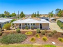 Step into a world of resort-style living with this exquisite for sale in Hemet California Riverside County County on GolfHomes.com