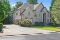 EXQUISITE LUXURY LIVING IN ST MARLO COUNTRY CLUB! This all-brick for sale in Duluth Georgia Forsyth County County on GolfHomes.com