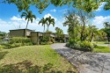 Welcome to this stunning 4 bed, 2.5-bath lakefront home located for sale in Plantation Florida Broward County County on GolfHomes.com