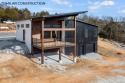 This brand new home is just a short easy walk to the community's for sale in Reeds Spring Missouri Stone County County on GolfHomes.com