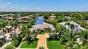 Welcome to waterfront living, in prestigious Frenchman's Creek for sale in Palm Beach Gardens Florida Palm Beach County County on GolfHomes.com