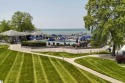 Welcome to the beautiful beach and towering pines of The Shores for sale in Williamsburg Michigan Grand Traverse County County on GolfHomes.com