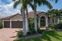 PUNTA GORDA ISLES WATERFRONT HOME W/91FT OF SEAWALL & SAIL for sale in Punta Gorda Florida Charlotte County County on GolfHomes.com