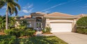 Welcome to your dream home nestled within an award-winning golf for sale in University PK Florida Manatee County County on GolfHomes.com