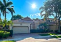 WELCOME TO THIS STUNNING TRADITIONAL MEDITERRANEAN ONE-STORY for sale in Coral Springs Florida Broward County County on GolfHomes.com