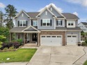 213 Lofty Oak Lane - Exceptional Luxury Living.  Discover for sale in Holly Springs North Carolina Wake County County on GolfHomes.com