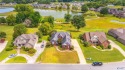 Beautiful brick home overlooking hole #9 at Canebrake Golf for sale in Athens Alabama Limestone County County on GolfHomes.com