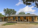 Come see this charming rustic retreat on 2 beautiful lots for sale in Spring Branch Texas Comal County County on GolfHomes.com