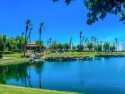Breathtaking panoramic golf course, lake & mountain views on an for sale in Palm Desert California Riverside County County on GolfHomes.com