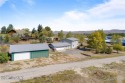 This spacious home, nestled near Deer Park Golf Course and the for sale in Deer Lodge Montana Powell County County on GolfHomes.com